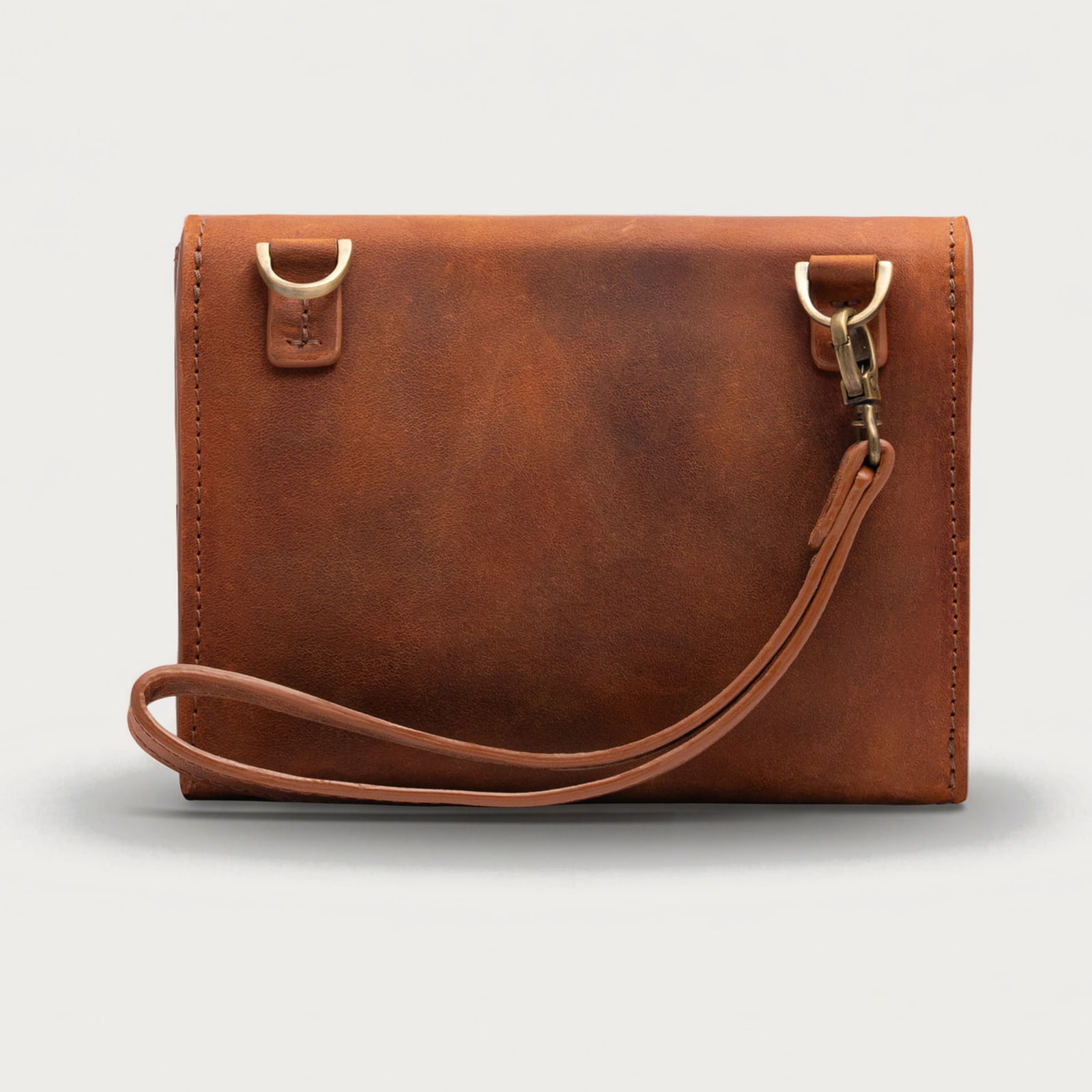 ARAS PINE Soren Crossbody — cognac envelope, back — leather crossbody bag (back view), handmade in Türkiye