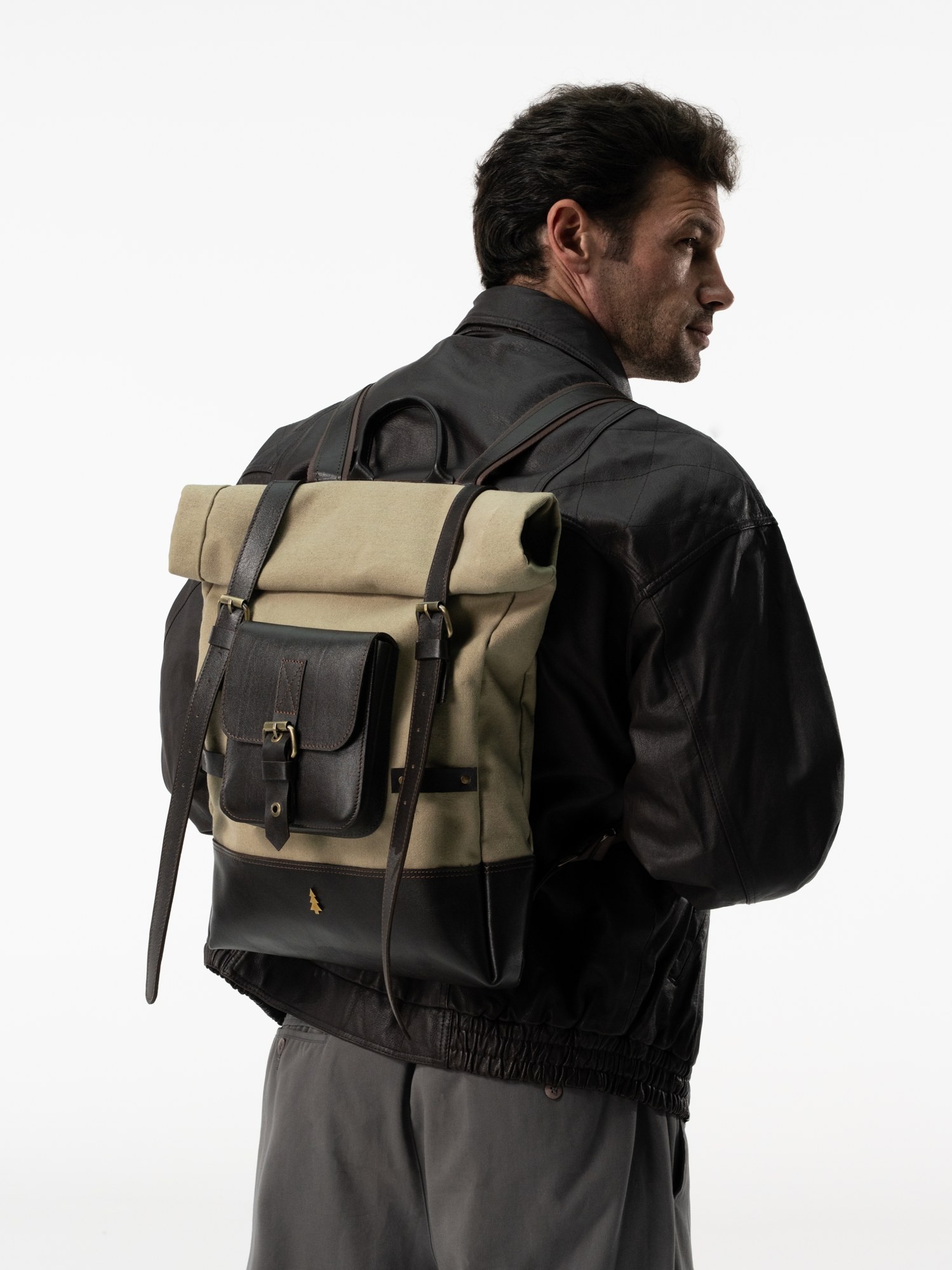 ARAS PINE Elvar Backpack — cream canvas, worn by model, back view — leather backpack (worn by a model), handmade in Türkiye